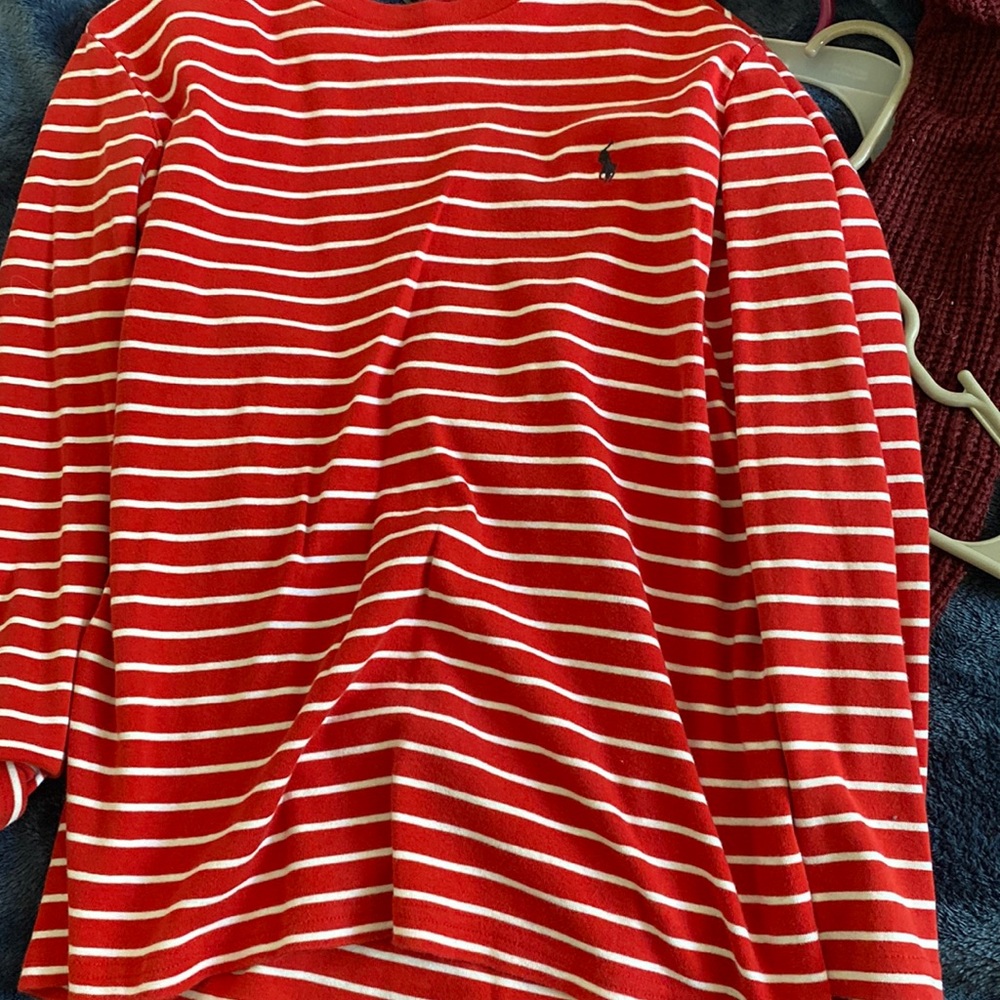 Red and white striped long sleeve. Never worn and in good condition
